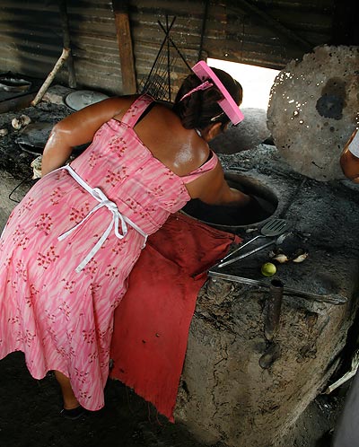 The heat coming from the coals in the bottom of the oven was intense.