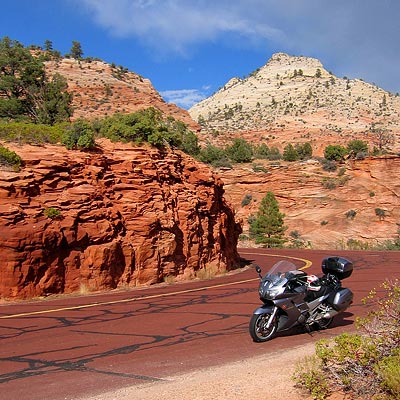 Red roads with big black tar snakes.